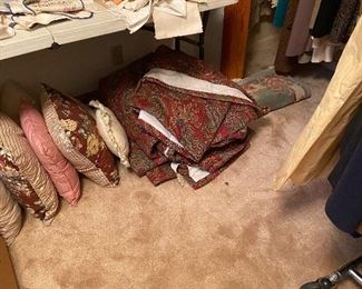 Pillows on floor- lots of napkins & more above 