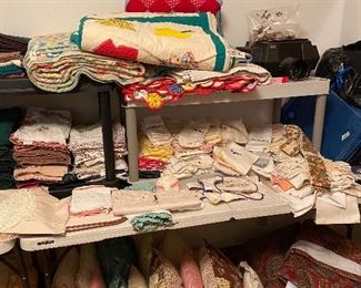 Quilts on top shelf and more