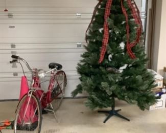 7.5 foot tree and Old fashioned bike