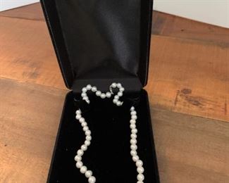 19" strand baroque pearls, knotted with sterling
