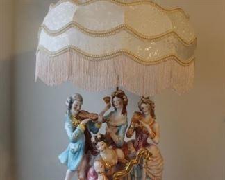 CAPODIMONTE LAMP AND SHADE FRENCH MUSICAL       W-18”    D-11”    H-23” (WITHOUT SHADE)    H-46” (WITH SHADE)