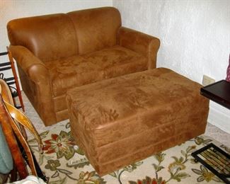 $495 - Love seat* & ottoman *love seat has a hide-a-bed & ottoman is a storage chest 