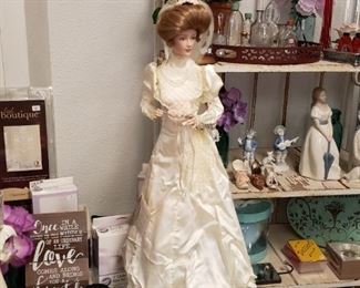 Lovely Vintage Bridal Doll with old perfume and misc bottles on the shelf.