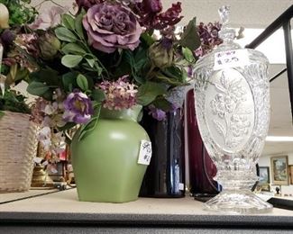 Gorgeous purple Flowers and Purple Vase as well as fancy cut glass candy jar.