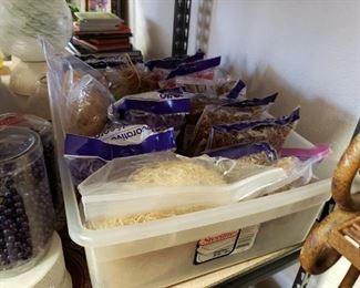 craft and colorful shredded confetti .. notice the purple garland strands in the plastic containers on the left.