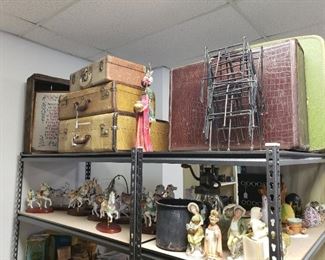 Vintage Luggage for Decorating, Fun!  I've even seen people put legs on them and paint them.    