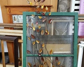 2 metal leaf wall art also showing framed screen