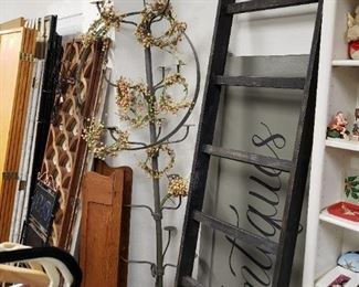 Hat rack holds about a dozen, pretty garlands, blanket latter and Antiques Sign