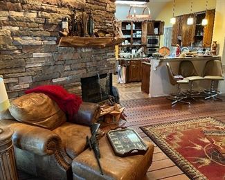 Native American collectibles; nailhead leather chair with ottoman