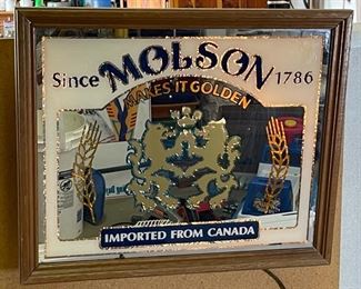 1985 Molson Beer Lighted Mirror Sign Makes it Golden	16.25x19.75x4.5in	HxWxD
