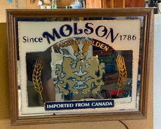 1985 Molson Beer Lighted Mirror Sign Makes it Golden	16.25x19.75x4.5in	HxWxD
