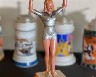 1960s Sterling Beer Girl Statue Bell Ringer with Card	19x4.75x4.75in	HxWxD
