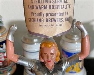 1960s Sterling Beer Girl Statue Bell Ringer with Card	19x4.75x4.75in	HxWxD

