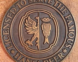 Hansa Beer Licensed To Serve The Famous Bronze Plaque Medallion	22.5x8.25in	
