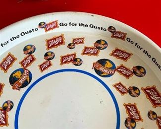 1960s Schlitz Go for The Gusto  beer tray	13in Diameter	
