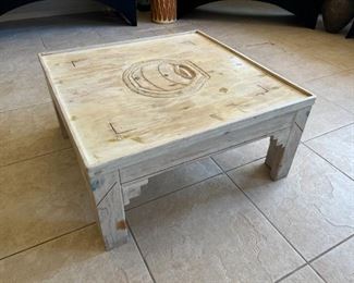 Ornately carved Southwestern coffee table	34.5 x 34.5 x 16.5	HxWxD
