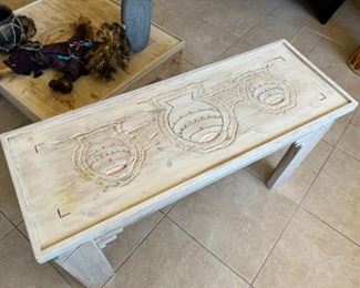 Ornately carved Southwestern console table	25x47.5x17in	HxWxD
