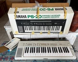 Vintage Yamaha Portable Keyboard Model PS-20 with original box	34x13in	
