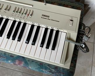 Vintage Yamaha Portable Keyboard Model PS-20 with original box	34x13in	
