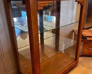 Solid Oak Southwestern design lighted display cabinet	74x30x17in	HxWxD
