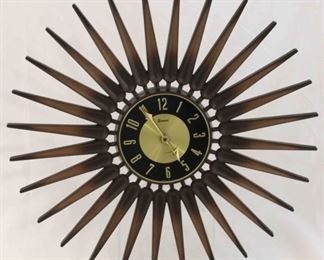 39 - Vintage Syroco starburst wall clock 22 1/2 diameter
