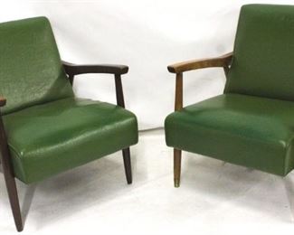 93 - Pair of green naugahyde lounge chairs 29 x 24 x 29
