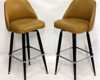 215 - Pair mid-century swivel bar stools in camel color 40 x 15 x 15
