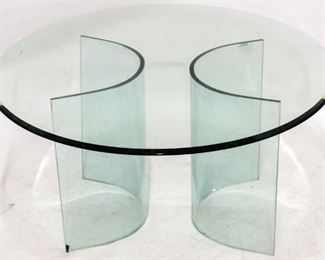 425 - All glass cocktail table Curved "C" glass supports, does have chips on corners 18 x 36 diameter tempered beveled glass top
