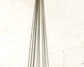 434 - Curtis Jere elongated urchin wall sculpture Mixed metal chromed steel "spores" that together form an urchin or pom-pom figure at top. Brass & chromed steel rods with steel ball tips extend down 50" tall
