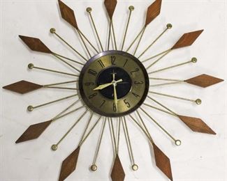 488 - Vintage Welby 22" starburst wall clock w/ key
