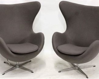 612 - Pair egg chairs after Arne Jacobsen The chair swivels 360Â° and tilts back by 45 degrees with the tilt resistance adjusted using the lever at the bottom of the chair Danish cashmere wool 41 x 34 x 32
