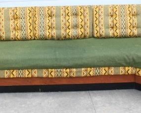 636 - Fantastic vintage mid-century boomerang sofa with triangular table in back repair to green covering - see photo chips at floor to base molding 27 x 127 1/2 x 52 1/2
