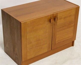 711 - Mid-century teak 2 door cabinet 22 x 31 1/2 x 17
