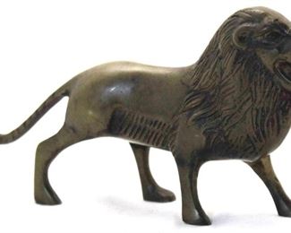 1042 - Small brass lion figurine 3.5 tall
