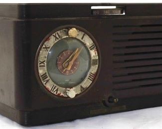 1053 - Vintage General Electric black tube clock radio 6 tall x 11 long x 5.5 wide
