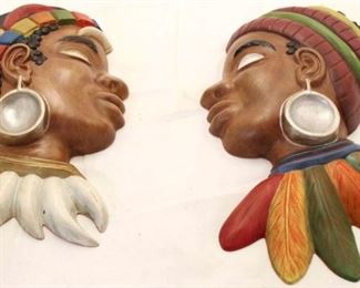 1135 - Pair of 1968 Aftrican chalkware wall figures 12.5 tall
