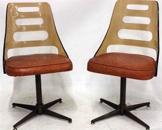 1162 - Pair orange & smokey acrylic chairs 34 tall x 19 long x 18 wide
