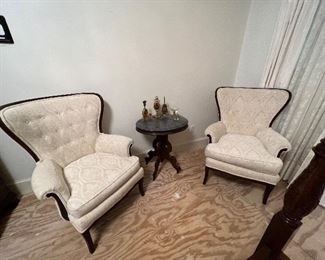 Pair of upholstered chairs, marble top table and vintage ormolu perfume bottles