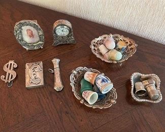 Collection of thimbles and sterling collectibles