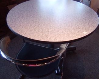 Round Table with Chrome and Leather Chairs