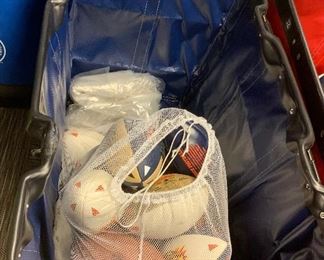 ROLLING BIN WITH GAME USED FOOTBALLS
