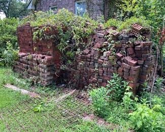 Massive pile of solid Bessemer red bricks