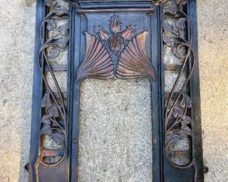 Cast iron art nouveau fireplace surround w/ mantle by Victoriana.
47” x 43”