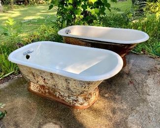 Pair of antique cast bathtubs with rare plinth bases. The interior  porcelain is in excellent condition. 
60” x 30” and 59” x 30”