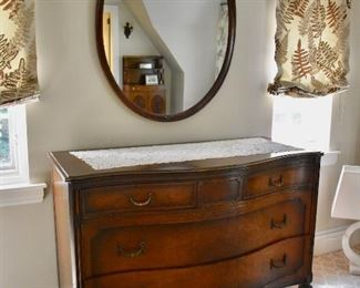 Serpentine dresser