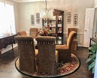 Handsome square glass top dining set