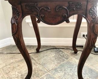 Pair of carved side tables