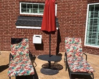 Pair outdoor chaise longes/umbrella and table