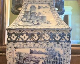 One of two matching blue & white Asian urns