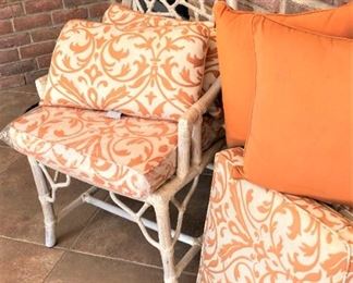 Single chair; orange cushions